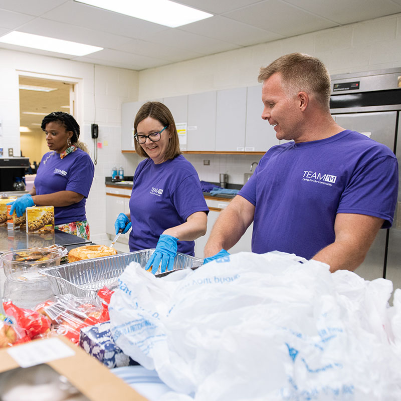 NM Volunteers working in a kitchen
