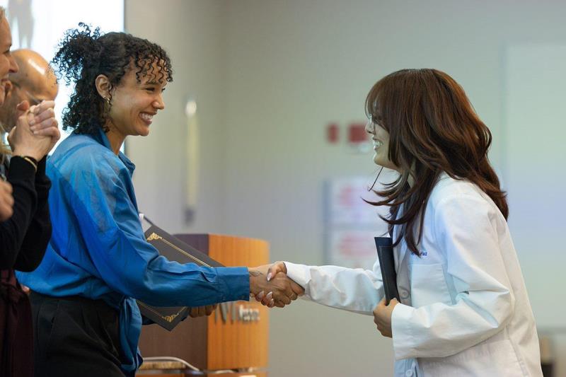 Students learning from physician