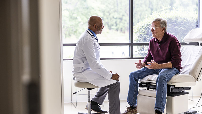 An older adult getting a medical check-up.