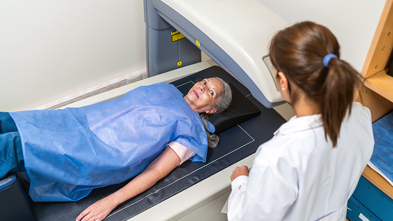 A person getting a bone density scan.