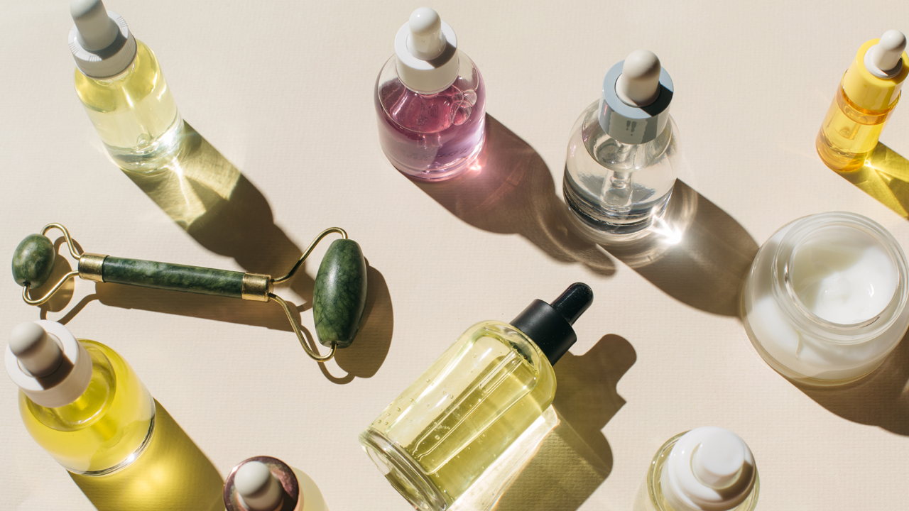 Glass bottles filled with cosmetic products.