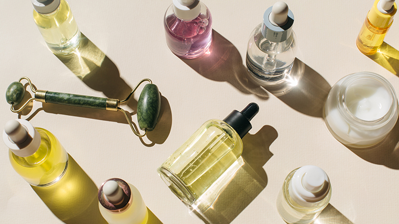 Glass bottles filled with cosmetic products.