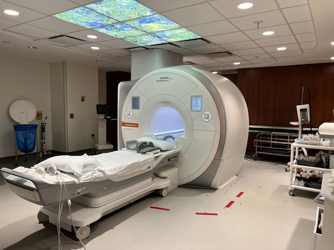 Cardiac MRI machine in a hospital treatment room.