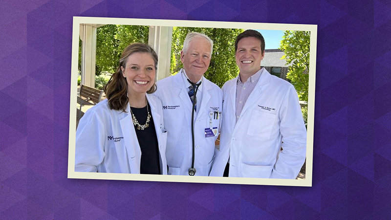 Kristina Quinn Degesys, MD, Thomas Quinn Sr, MD, and Thomas Quinn Jr, MD in white lab coats in front of a pavilion with green trees in the background. Kristina has sandy blond hair in a pony tail, Thomas senior has short white hair, and Thomas Jr. has short dark hair.