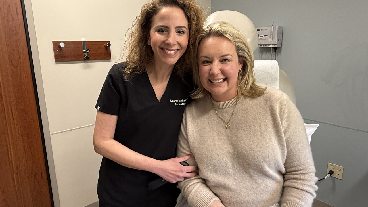 Ashley Daly with her physician.