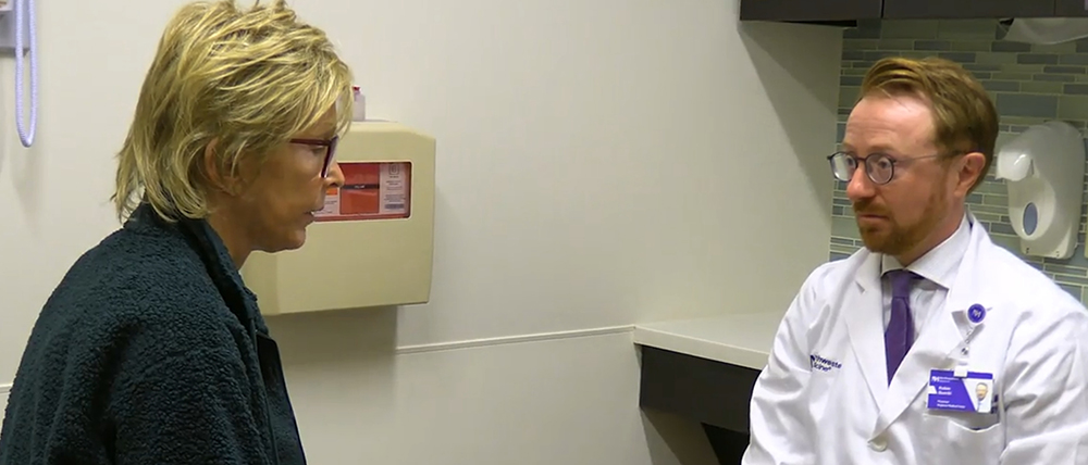 Michelle Wilcox with Robin A. Buerki, MD in a consultation room.