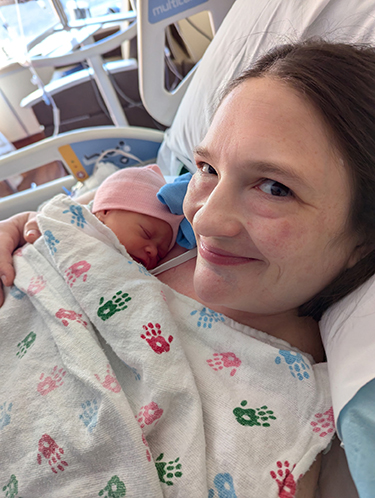 Chelsea Cheveria with her baby girl in the hospital.