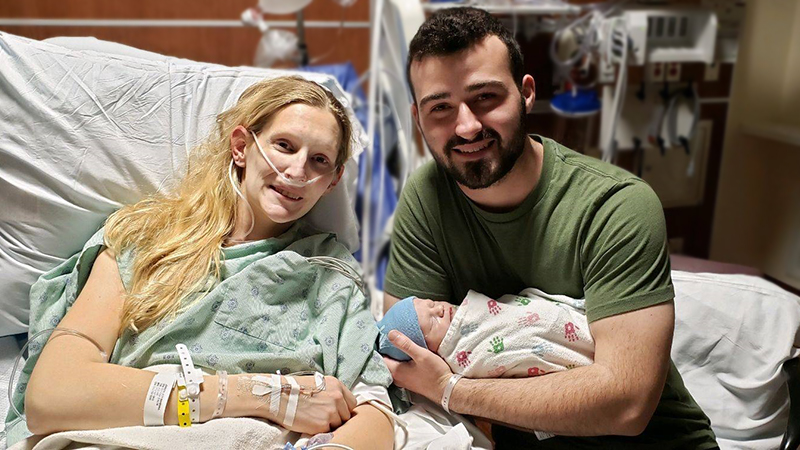MaKenna Lauterbach and her husband in the hospital with newborn Colter.