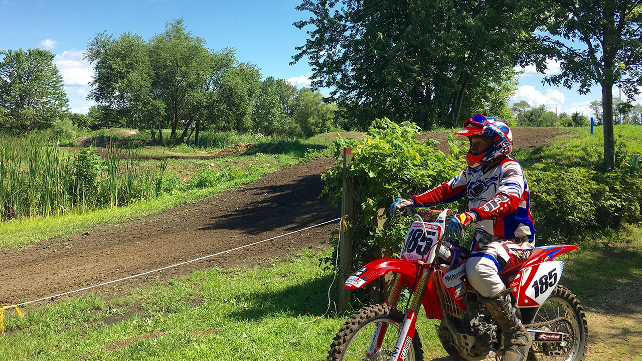 nm-motorcross-racer-celebrates-victory_feature