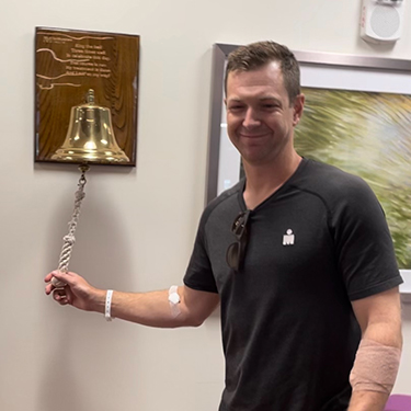 Kevin Humphrey ringing a bell.