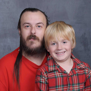 Portrait of Derrick Hall and his nephew