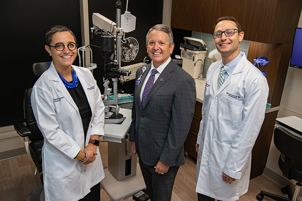 Nicholas Volpe, MD, chair of the Department of Ophthalmology at Northwestern Medicine (center) welcomes Michelle Andreoli, MD, and Michael Andreoli, MD, to Northwestern Medicine in Naperville.