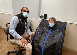 Dr. Jay Pandit conducts a sweat test as part of the BASIC study
