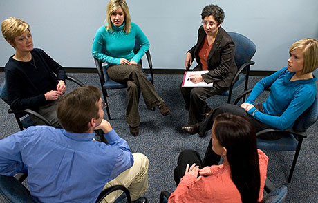 Support group having a group discussion about substance abuse