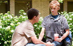 Teens talking outside