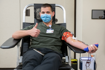 A Northwestern Medicine employee donating blood.