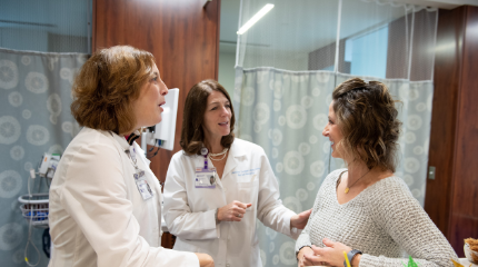 Northwestern Medicine breast health team talks with a patient