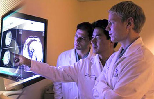 Northwestern Medicine doctors looking at images