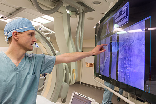 Northwestern Medicine provider pointing at a computer screen