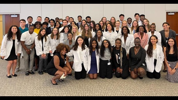 Northwestern Medicine pre-med interns stand together in group photo