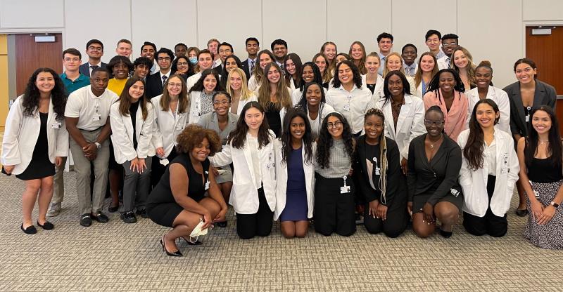 Northwestern Medicine pre-med interns stand together in group photo