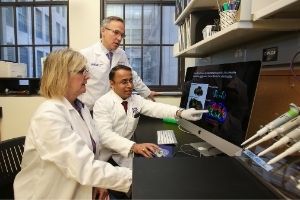 Three Northwestern Medicine physicians working on pathology research