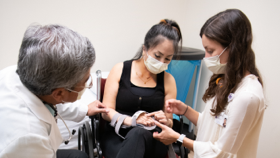 Patient being fitted with a prosthetic
