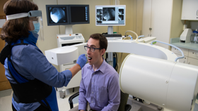 Patient having his swallowing tested