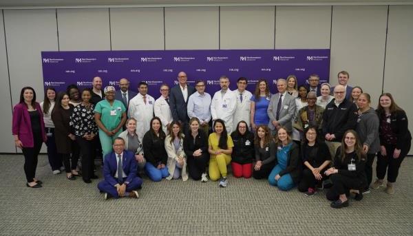 Transplant team standing for a photo.