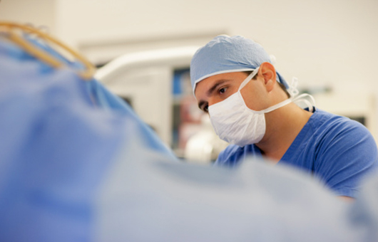 Northwestern Medicine surgeon concintrating during pediatric general surgery