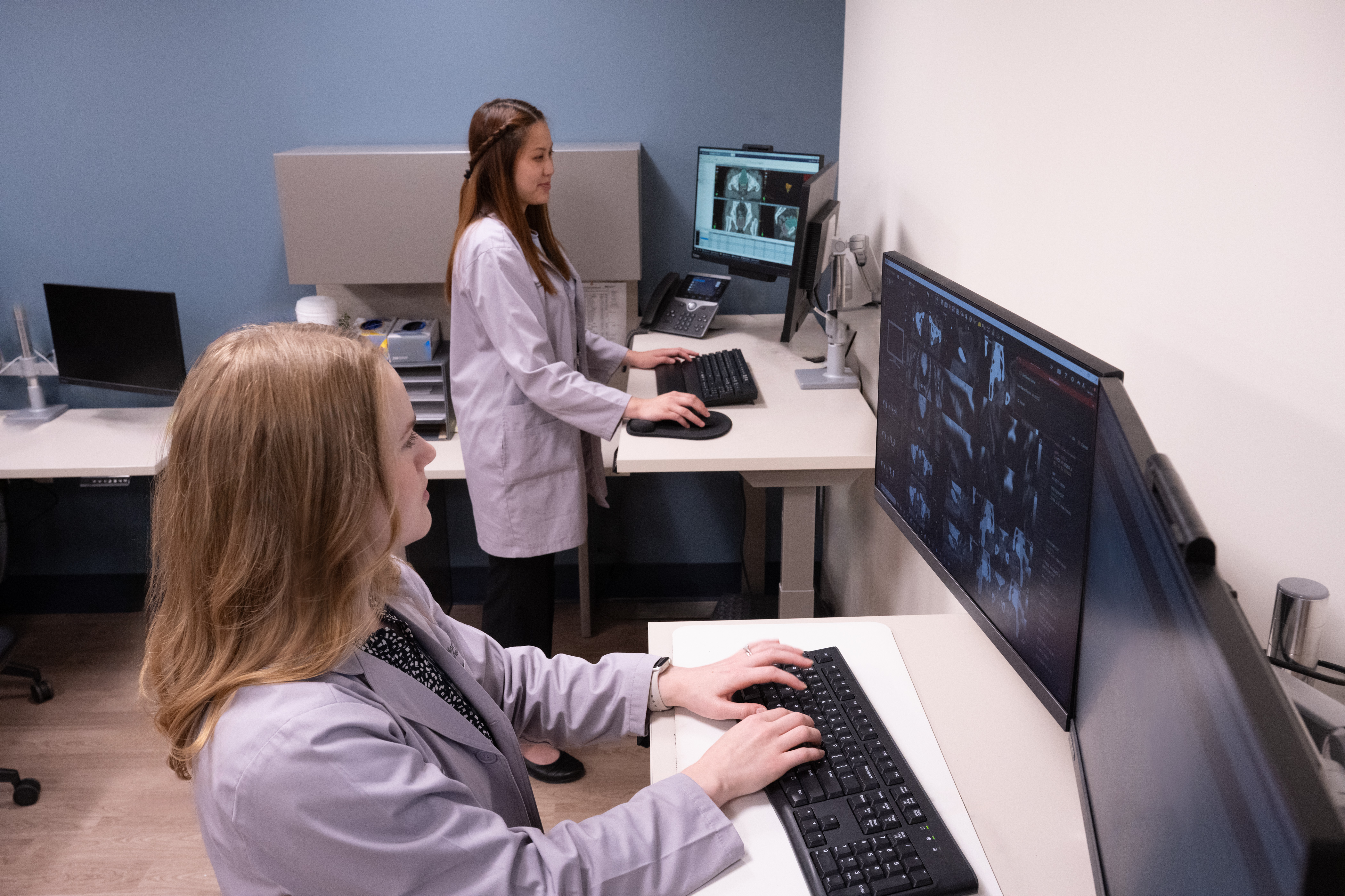 Radiation oncology care team reviewing imaging