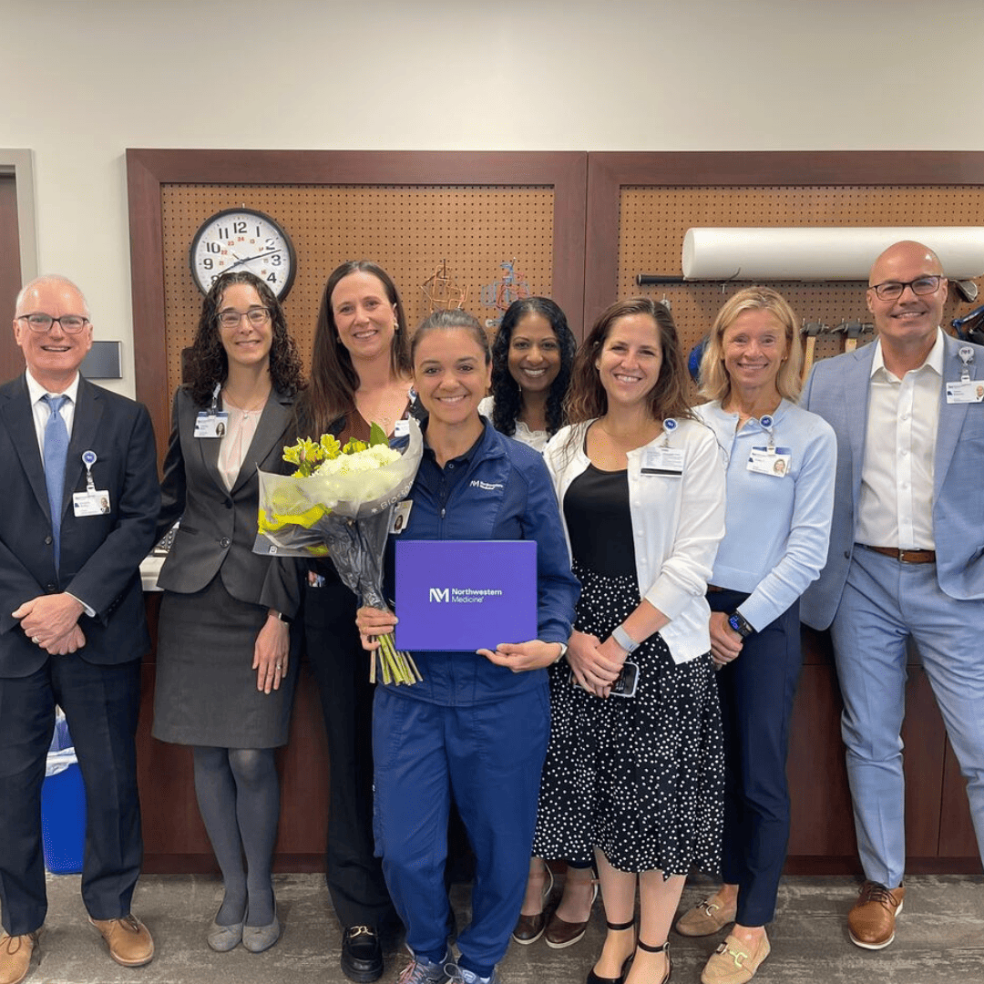 Staff members receiving the Excellence in Care Award