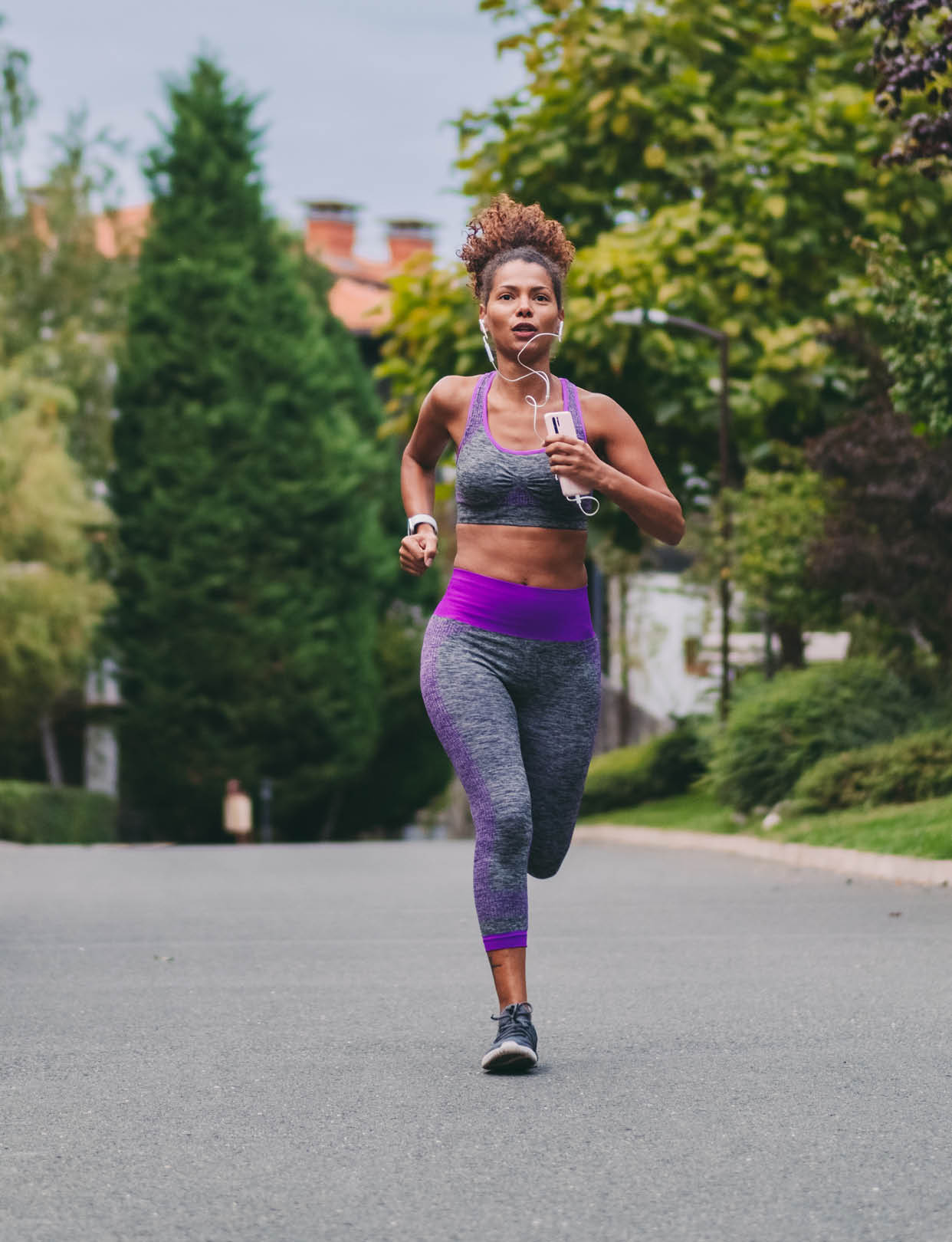 Young woman jogging outside