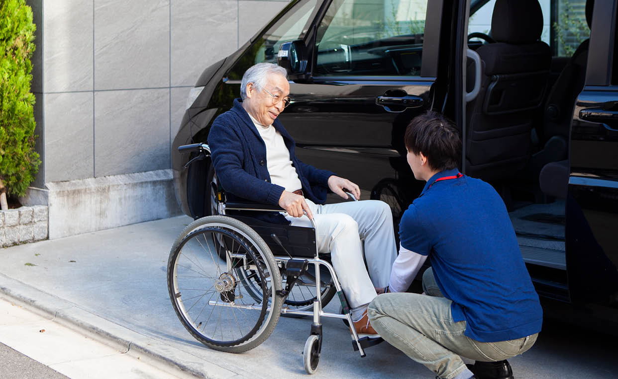 An elderly man and public services for active living despite physical disability.