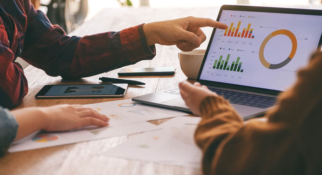 Three businessman working and discussing business together in a meeting
