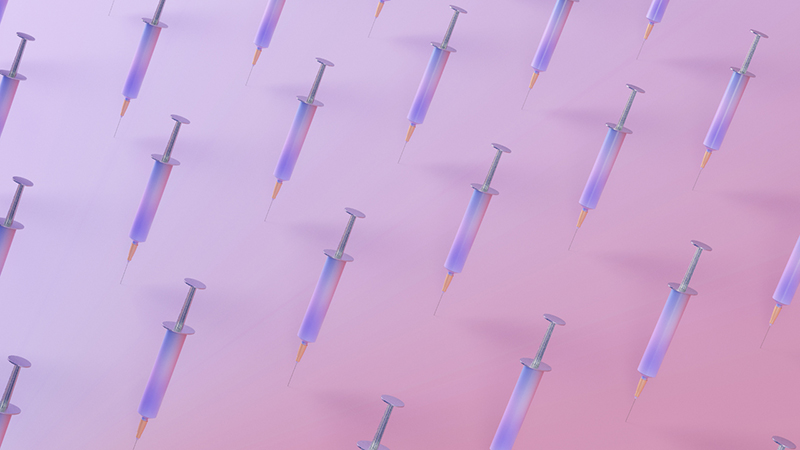 Syringes in a repeating pattern on a pink and purple background.
