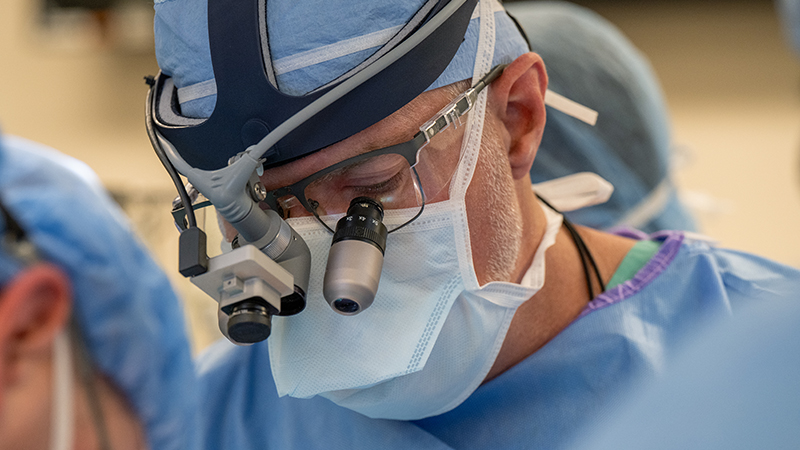 Douglas Ross Johnston, MD performing surgery.
