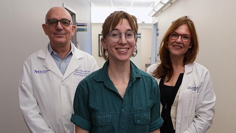 Iona Woolmington standing between Dr. Milad and Dr. Jungheim.